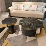 Designer Nesting Coffee Tables with Organic Curves and Layered Silhouettes